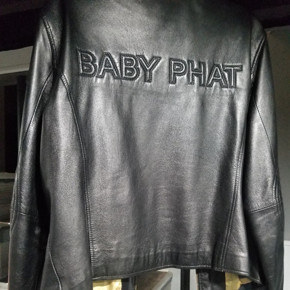 Black ladies leather baby phat jacket.  Size xl